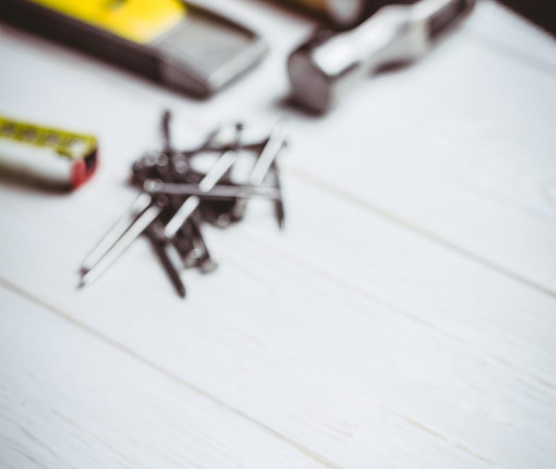 DIY tools laid out on table shot in studio
